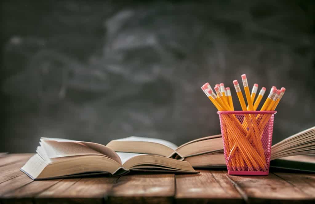 Pencils and pile of books